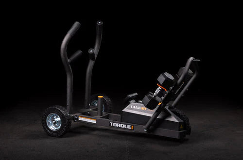 Torque Fitness Tank M1, push sled with curved frame and training handles on black background.