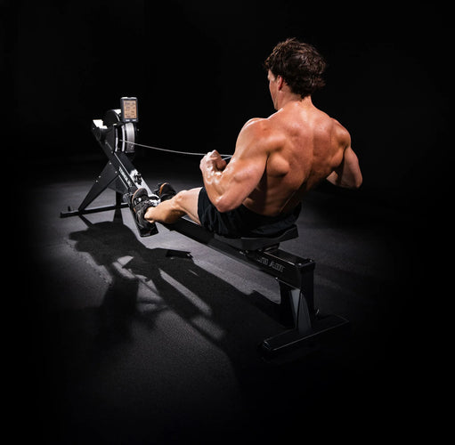 Torque Fitness Stealth Air Rower, air rower with seat rail, handle and performance console product view.