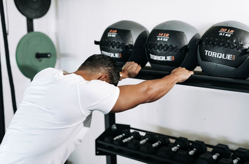Man Stretching With 6 Foot Universal Storage Rack