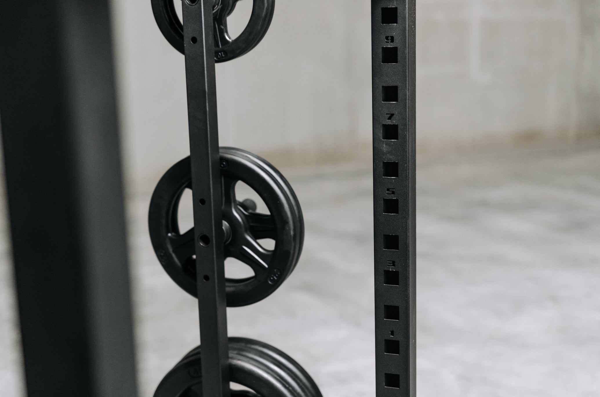 Numbers Engraved On Rack With Black Grip Plates On Storage