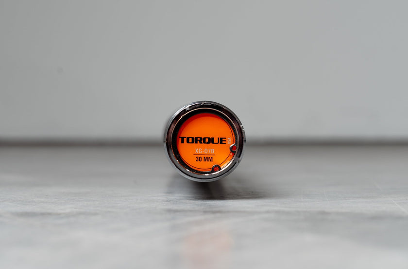 Orange End Of Torque Barbell With Logo