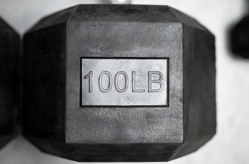 Close Up Of 100 LB Marking On Torque Dumbbell