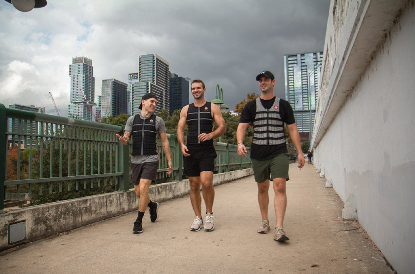 Three Men Wearing Hyperwear Hyper Vests Outside